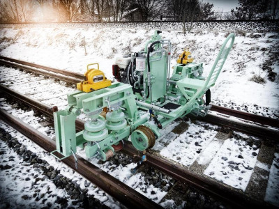 Машина для переукладки рельсов Robel Roxchange